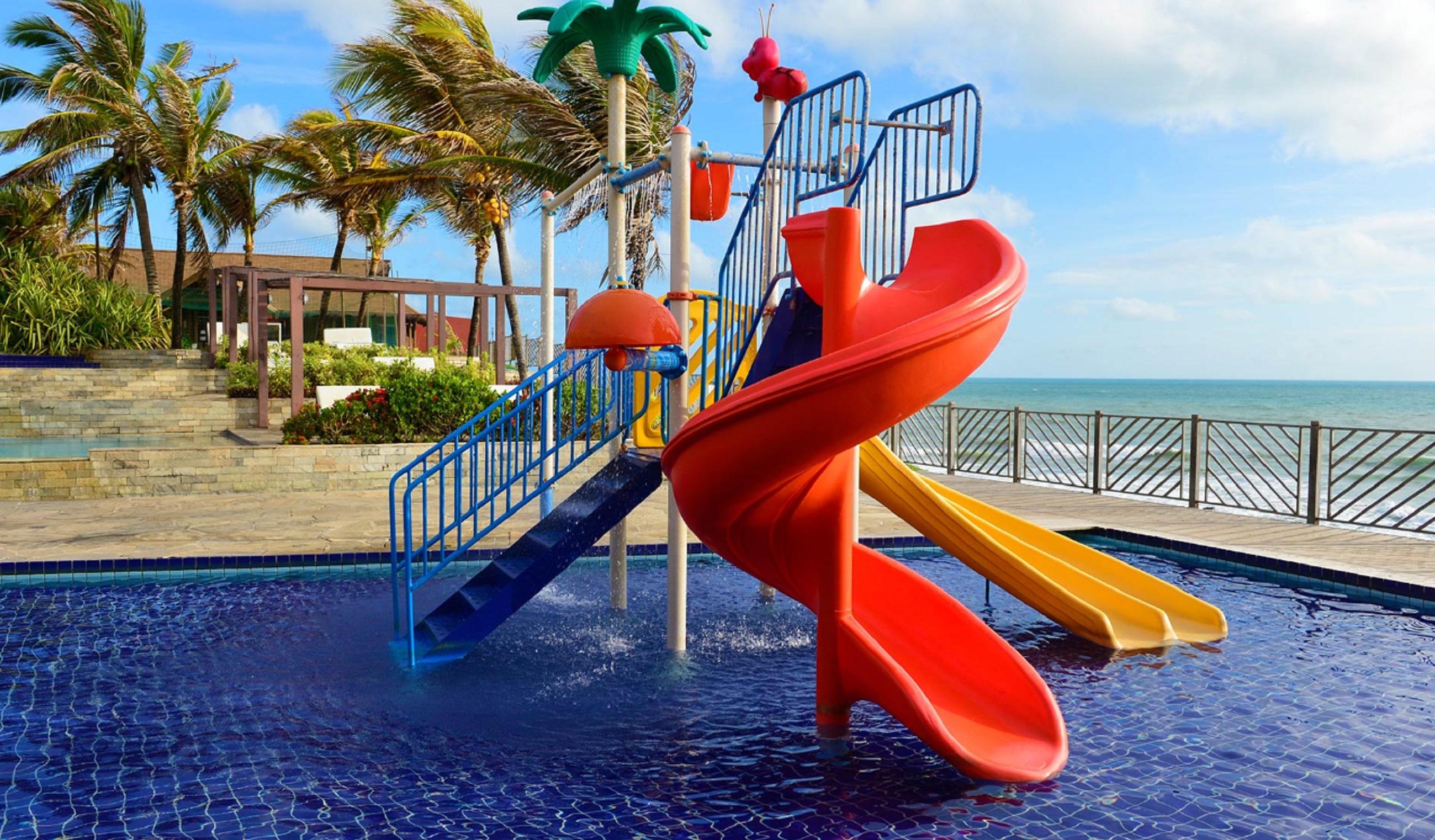 Hotel Wish Natal Esterno foto A water slide at a water park
