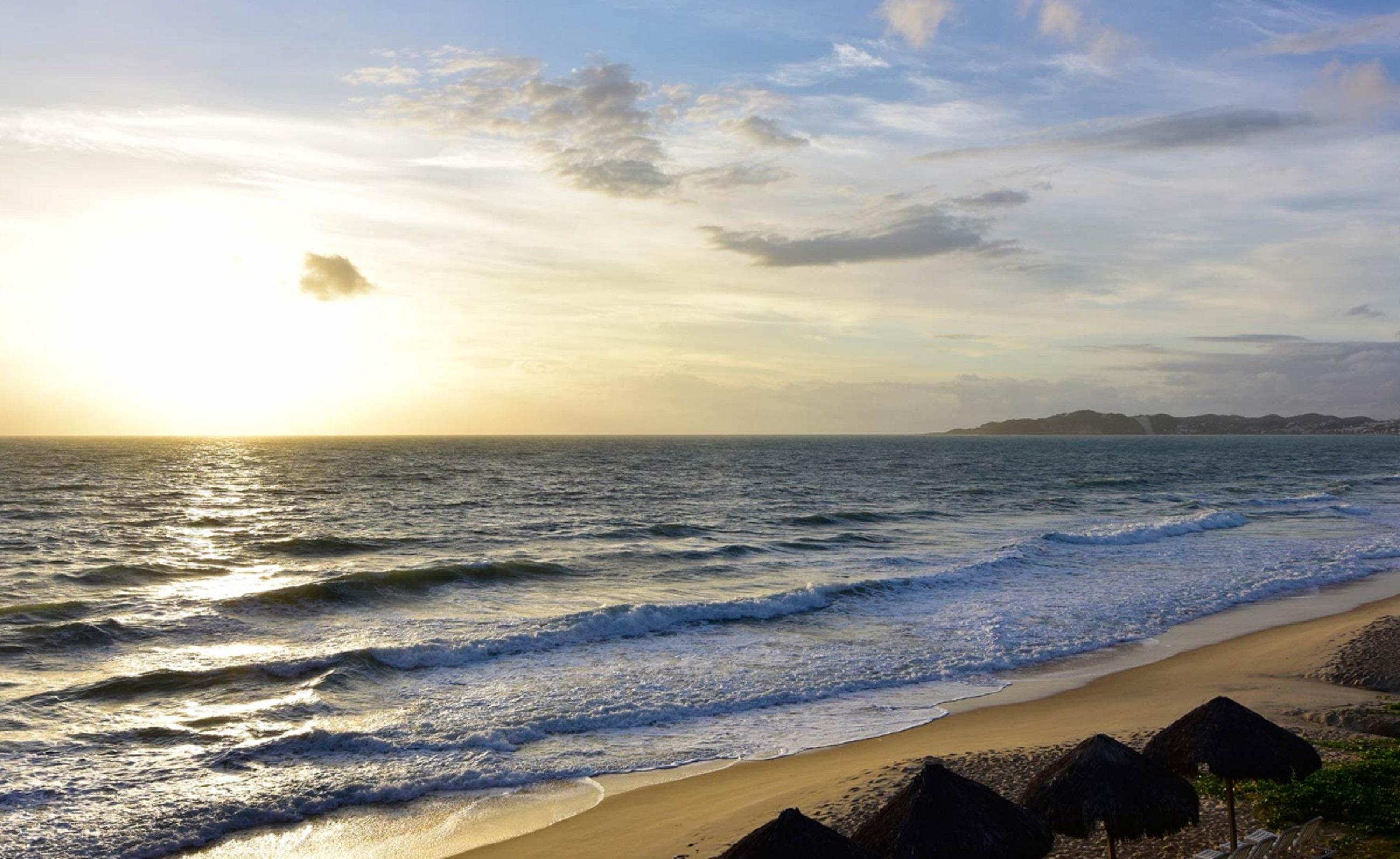 Hotel Wish Natal Esterno foto Sunset at the beach