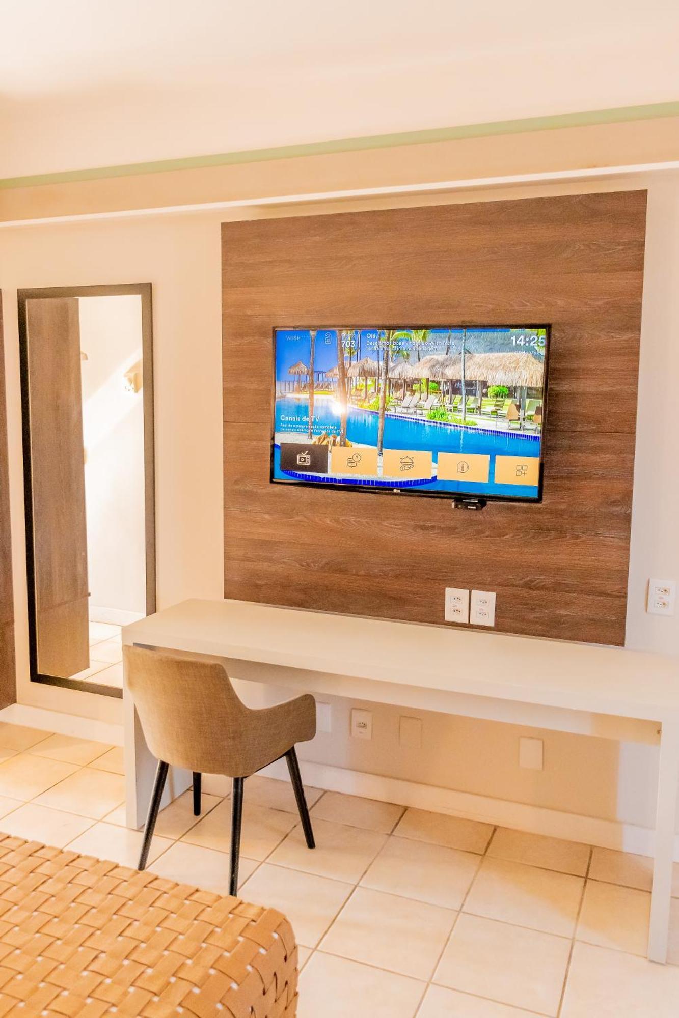 Hotel Wish Natal Esterno foto A television in a hotel room